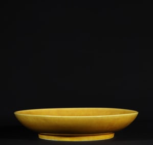 An Exquisite Ming Dynasty Hongzhi yellow glaze engraved dragon pattern plate