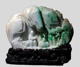 A jade arhat holding sutra ornament