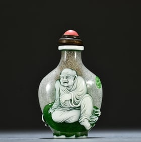An Exquisite clear glazed nest carved arhat snuff bottle