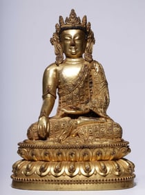 A Qing Dynasty bronze gilt immovable statue of the Buddha