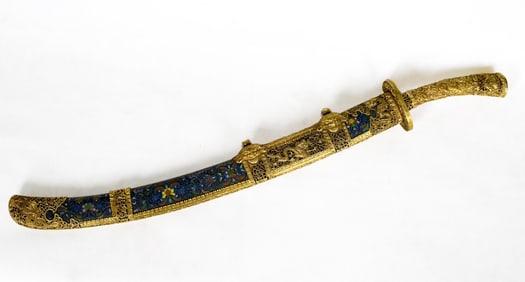A Qing Dynasty cloisonne copper gilt engraved dragon pattern waist knife