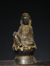 A bronze gold statue of Guanyin Buddha