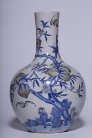 A "Great Qing Dynasty Guangxu Year" blue and white glaze red Fushou pattern Tianqiu bottle