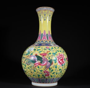A Qing Dynasty Guangxu yellow ground pastel dragon wearing a floral pattern appreciation bottle