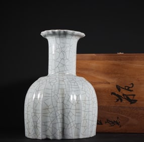 A Song Dynasty official kiln moon white glazed polygonal bottle