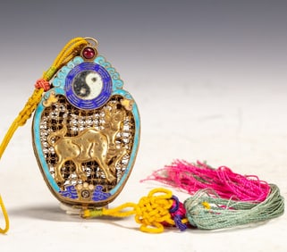 A copper-gilt burnt blue sachet