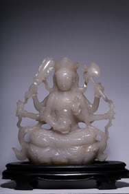 A seated statue of the Buddha mother in Hetian white jade in the Qing Dynasty