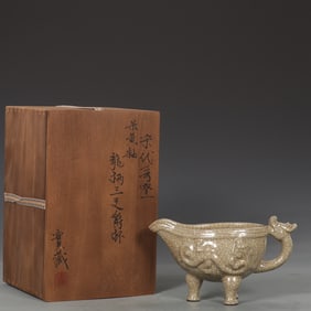 An Exquisite Southern Song Dynasty Ge kiln beige glazed dragon handle three-legged cup