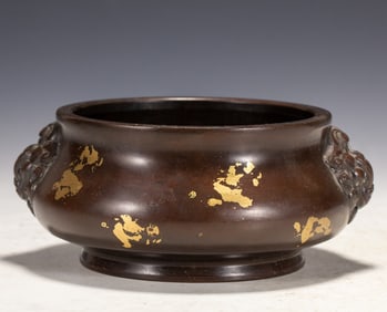 An Exquisite copper and gold stove