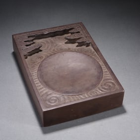 A Qing Dynasty stone carved seawater pattern inkstone