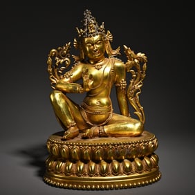 A bronze gilt green Tara Tibetan Buddha statue scholar's ornament