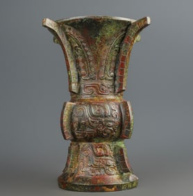 An Exquisite Western Zhou _ bronze round statue