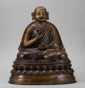 A bronze Tibetan master statue of the Ming Dynasty