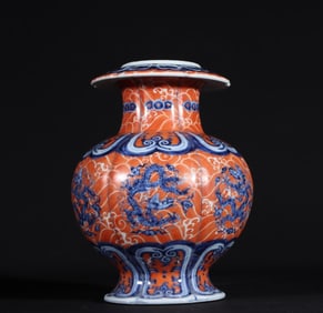 An Exquisite Ming Dynasty Xuande blue and white alum red pomegranate zun