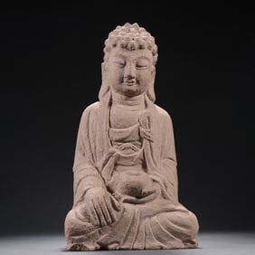 A Tang Dynasty stone carving of Shakyamuni Buddha