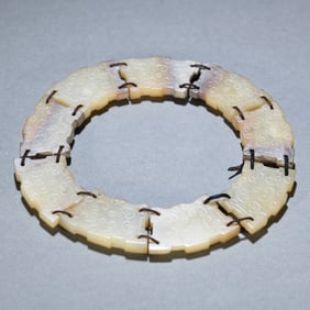 An Exquisite gouyun pattern nine-in-one jade