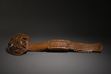 A boxwood unicorn Ruyi scholar's ornament