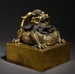 A bronze gilt dragon seal scholar's ornament