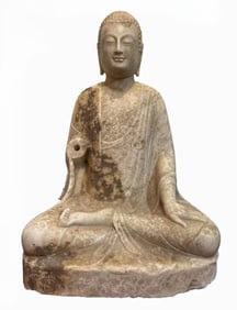 A white marble Buddha statue before the Tang Dynasty