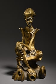 A bronze gilt skinny Arhat Buddha statue study ornament
