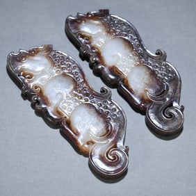 A pair of Zhan Han Gao Gu Jade Dragon Pei