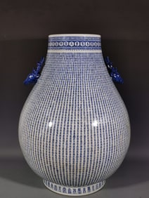 A Qing Kangxi blue and white longevity deer head double ear