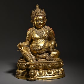 A bronze gilt Tibetan Buddha statue study ornament