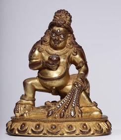 A Qing Dynasty bronze gilt silver black God of Wealth statue