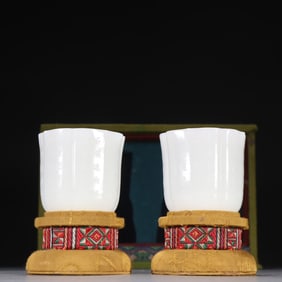 A pair of Qing Hetian jade carved poems and melon cups