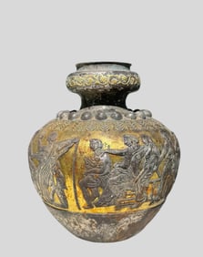 A Tang Dynasty silver-gilt Persian figure jar