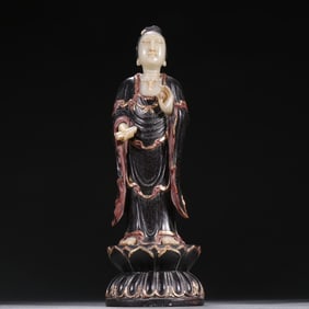 A clear rosewood inlaid hibiscus stone Guanyin statue