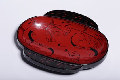 A Han Dynasty double bird pattern feather lacquer cup