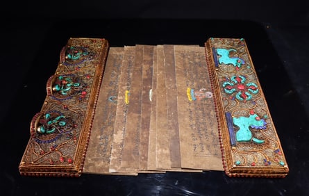 An Exquisite Tibetan silver filigree inlaid with gemstones, the scriptures are small