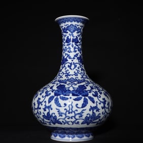 A Qing Dynasty Qianlong blue and white entangled branch flower and fruit pattern appreciation bottle