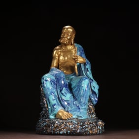 A Qing Dynasty furnace glaze gilt Arhat ornament