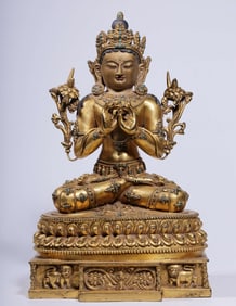 A Qing Dynasty bronze gilt turquoise statue of Guanyin