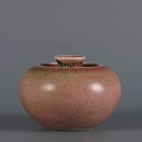 A piece of cowpea red glazed apple made in the Kangxi year of the Qing Dynasty