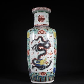 A Qing Dynasty Kangxi multicolored dragon pattern rod bottle