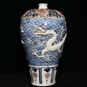 A piece of Yuan blue and white glaze red relief dragon pattern plum vase