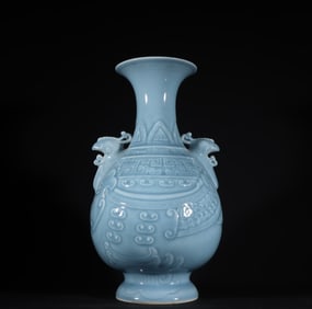A piece of Qing Dynasty Qianlong sky blue glazed phoenix ear bottle