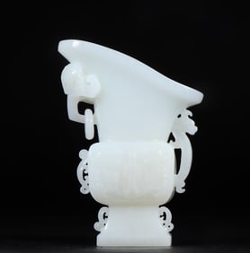 A piece of Qing Hetian jade white jade gluttonous pattern cup
