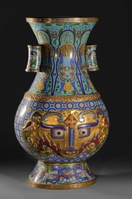 A cloisonné enamel gluttonous pattern filling pot