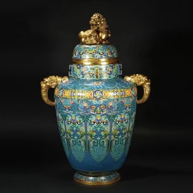 A piece of copper gilt cloisonné cloisonné enamel dragon ear lion top jar