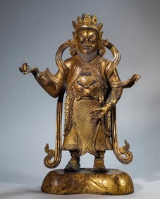 A bronze gilt statue of the Heavenly King
