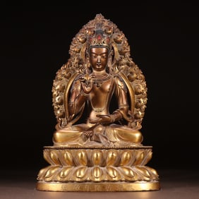 A bronze gilt statue of the Buddha of Longevity from the Qing Dynasty