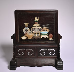 A piece of rosewood inlaid treasure interstitial ornament