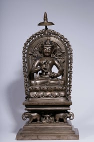 A Qing Dynasty bronze gilt silver Vajrasattva hammer seated statue