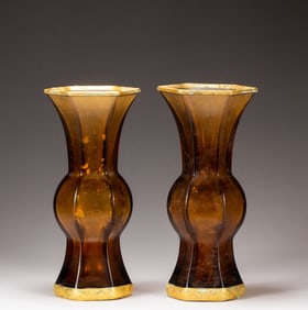 A pair of glass-coated gold hoops