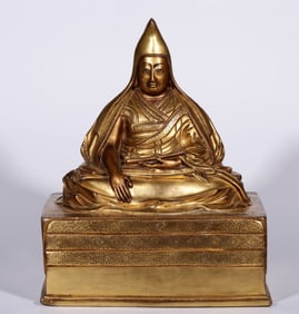 A Qing Dynasty bronze gilt statue of Guru Atisha