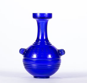 A gilt poetry bottle